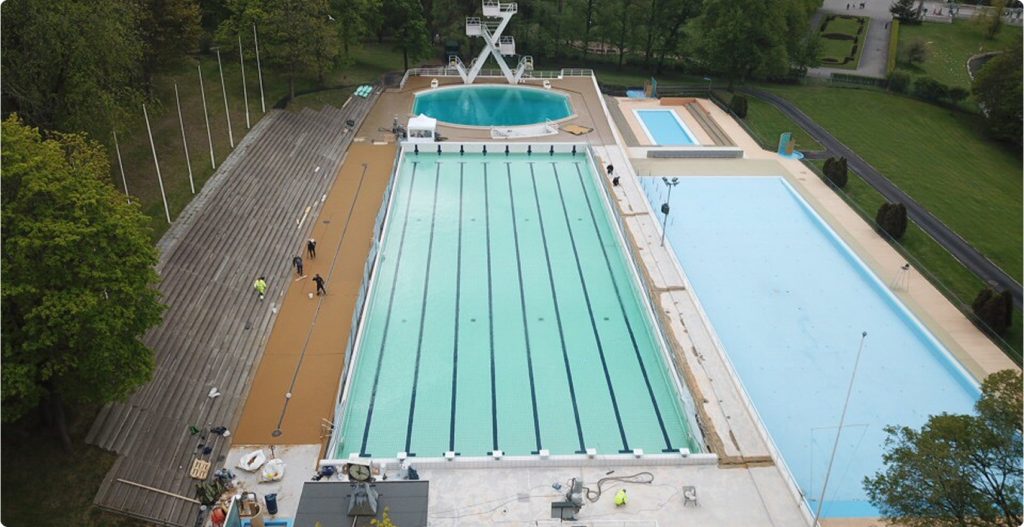 Outdoor swimming complex seen from above with anti-slip Multi-Grip coating around the pools